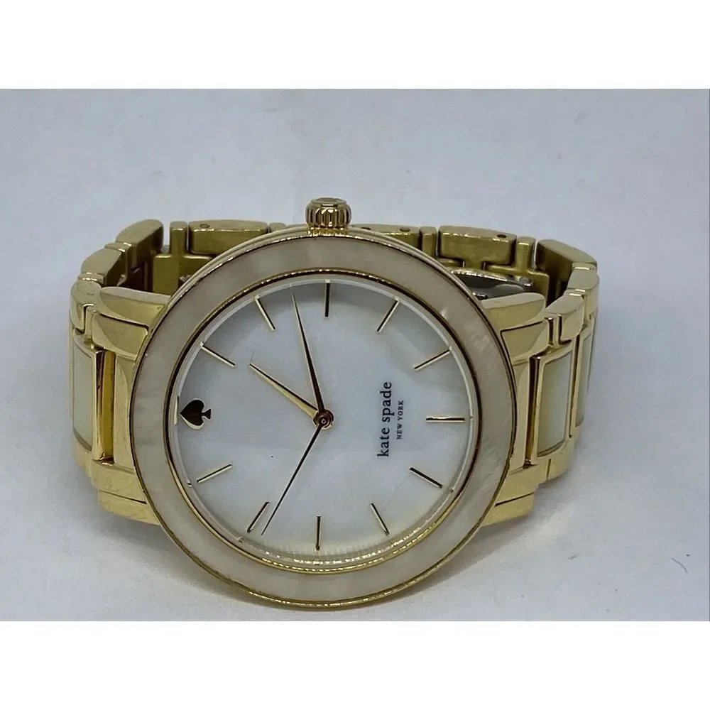 Kate Spade 0394 Womens Gold Stainless Steel Analog Dial Quartz Wrist Watch XX581